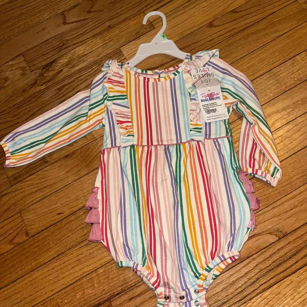NWT Ruffle butts rainbow waterfall, long sleeve onesie
